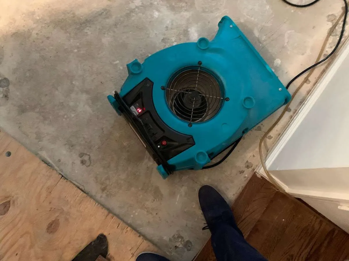Air mover drying subfloor during Leak Detection & Repair in Queen Creek
